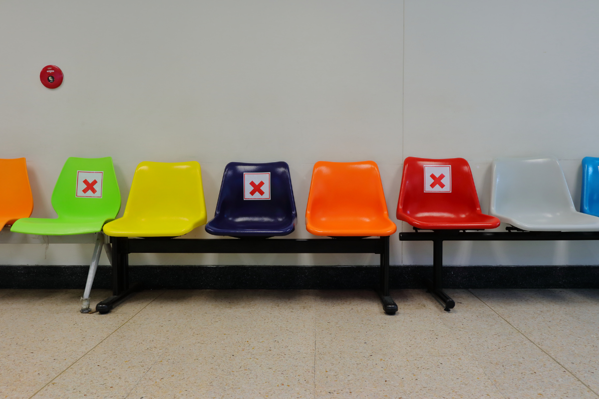 chairs in waiting area are forbidden by marking with a cross symbol to follow distancing norms